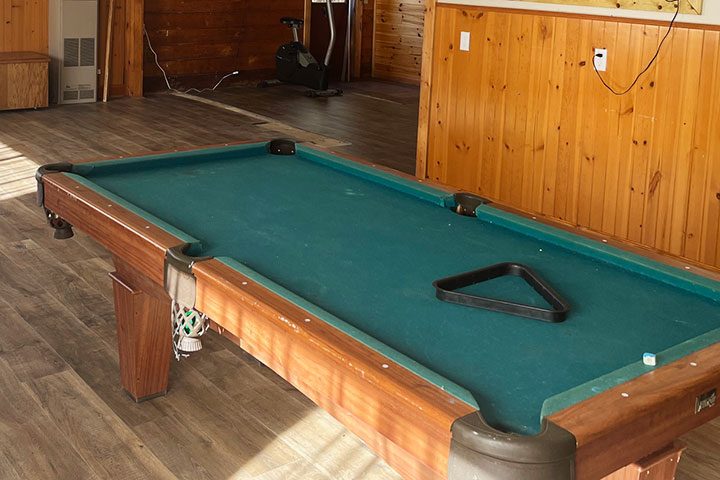 Game room and bar Pool Table in the Game Room and Bar Area Image