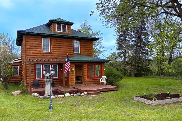 Rustic Retreat Front of AuSable River Charm House Image