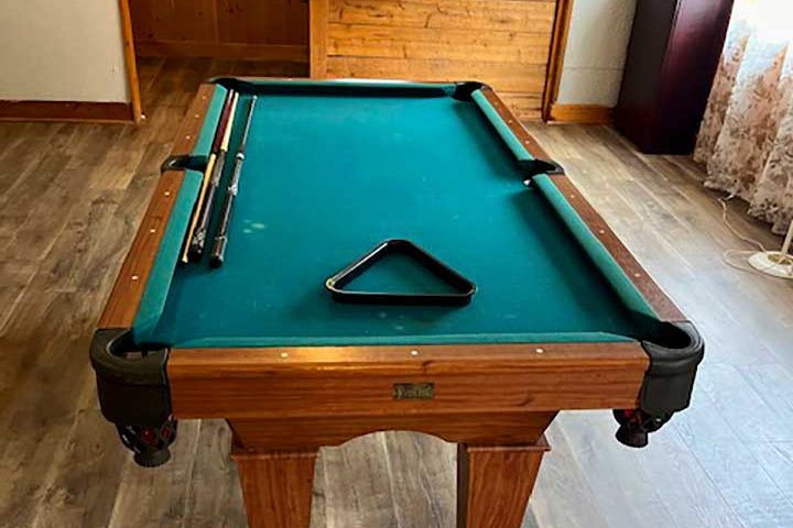 Pool Table in the Game Room and Bar Area Image